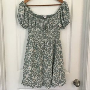 Hailey & Co Dress. Smocked Bust. Short Sleeves. Green with floral print.